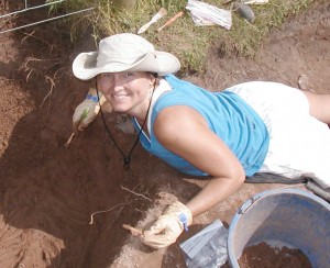 Excavating a burial from the "Bowl Hole" at Bamburgh Castle, Northumberland, England.